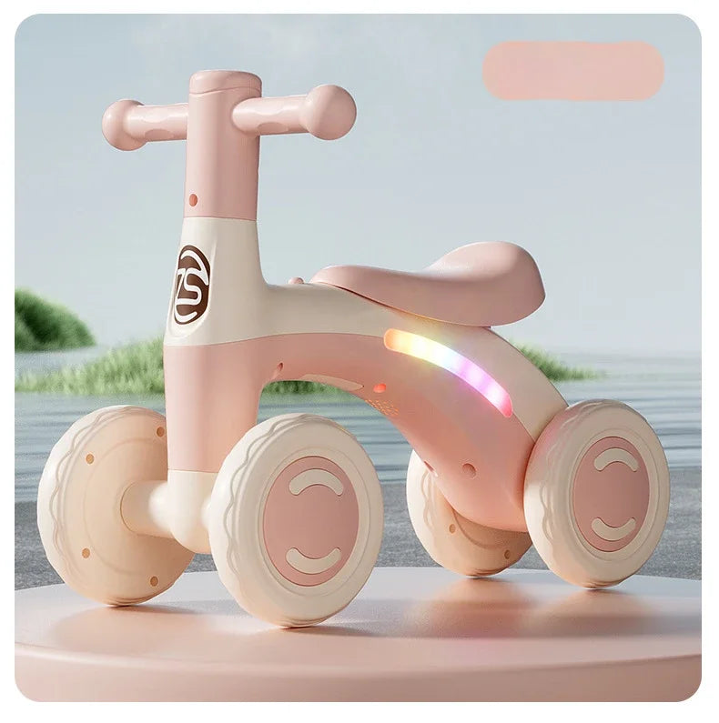 Anti-Tip Baby Balance Bike Ages 1-3 4-Wheel Silent Glider Walker Toy Toddler Training Ride-On with Safety Wheels Indoor Outdoor
